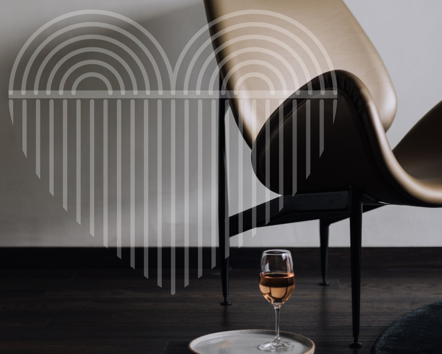A black grand piano silhouette with a glass of white wine on a dark floor, modern geometric arc design on wall behind